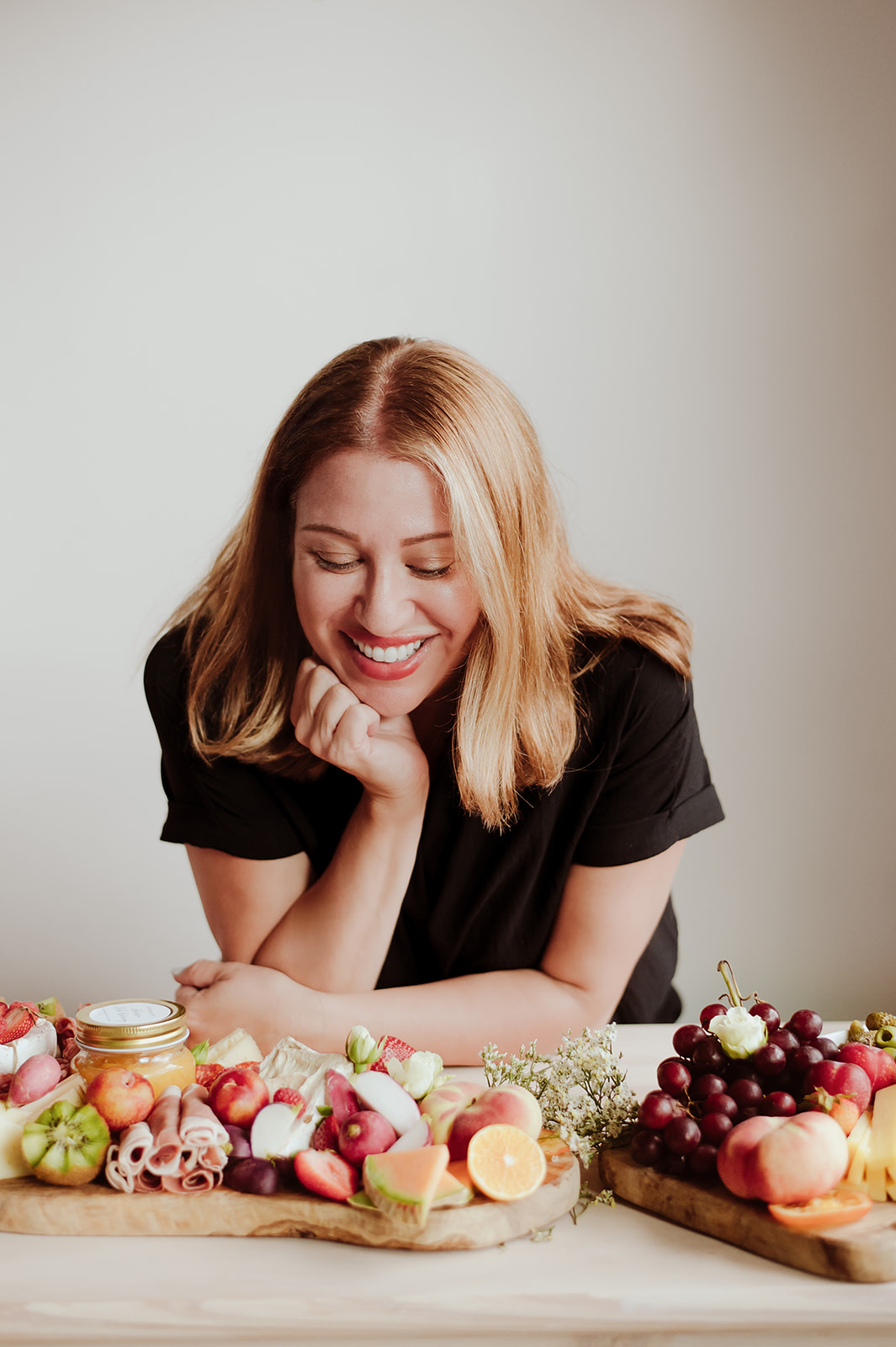 Chef and food stylist Marissa Fisk with artisanal charcuterie boards